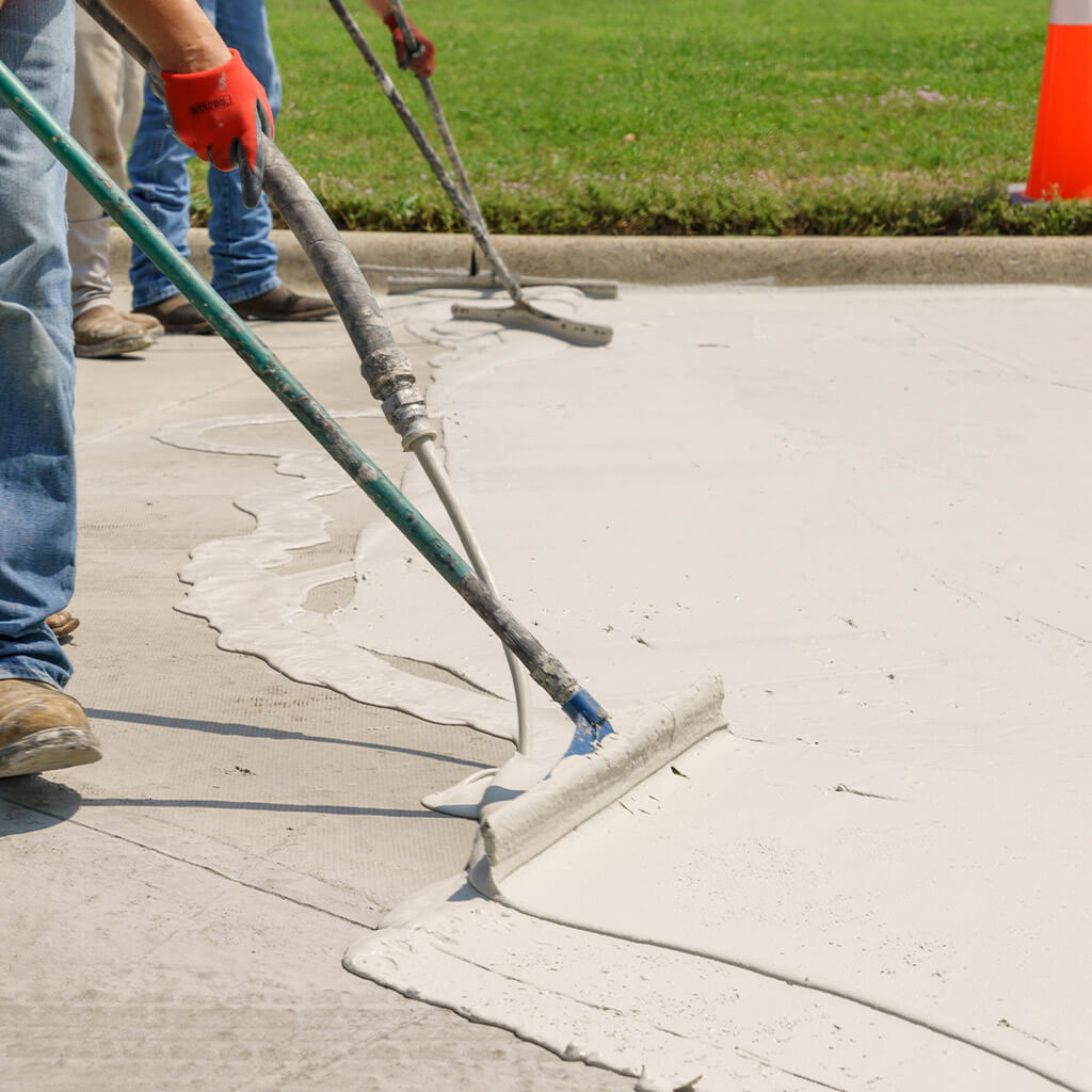 Repairing concrete in Dallas, TX with OXCON Systems concrete resurfacing